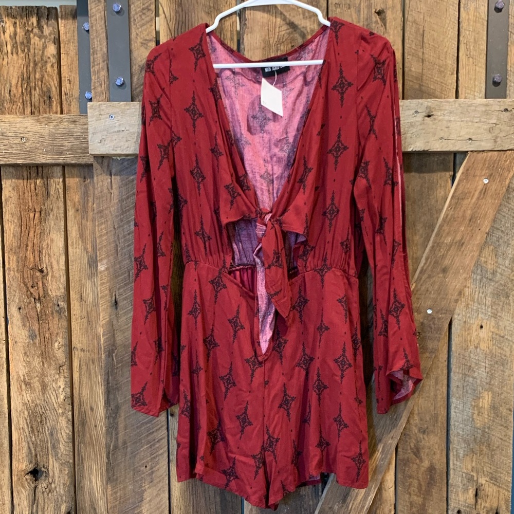 NWT Maroon and black pattern romper
